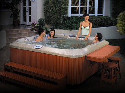 A group of people sitting around Hot Tubs & Spas.